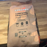 Cooking on fire lumpwood charcoal